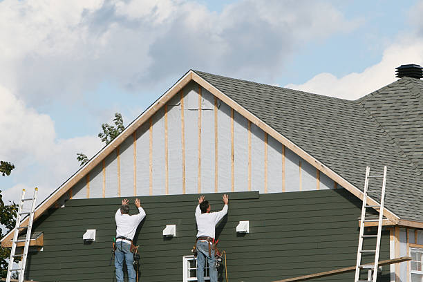 Professional Siding technician working in Croton, OH
